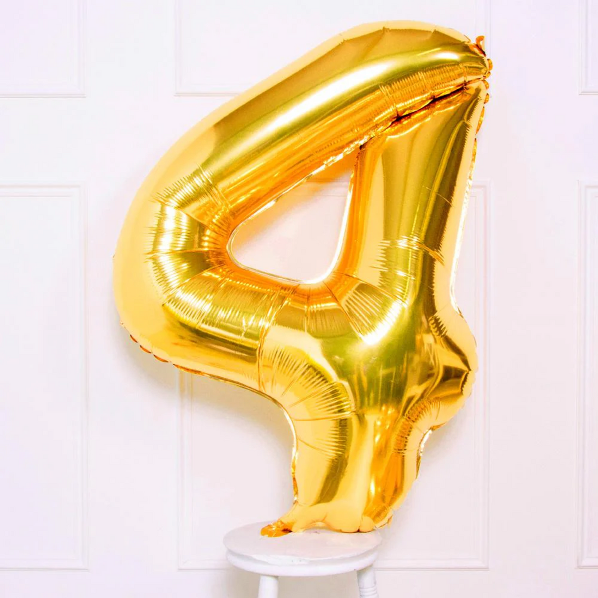 Gold foil number 4 balloon 16 x 40 cm